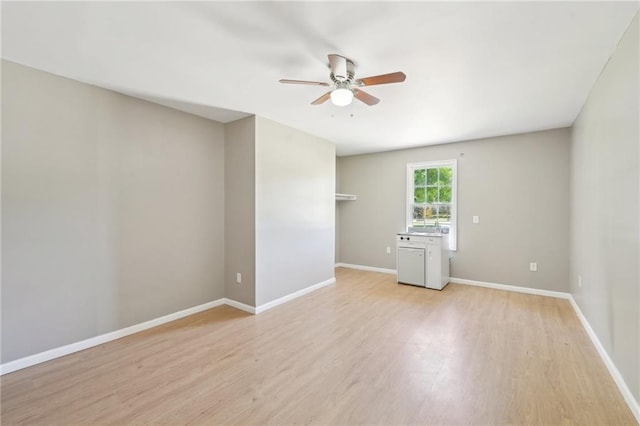3388 Hamilton Mill Rd, Buford, GA 30519 - spare room with ceiling fan, light wood-style floors, and baseboards