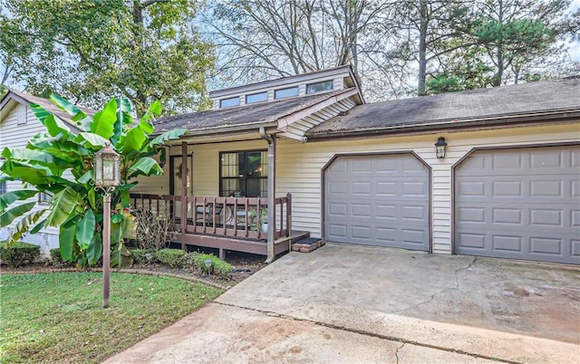 view of front property with a garage and a front lawn