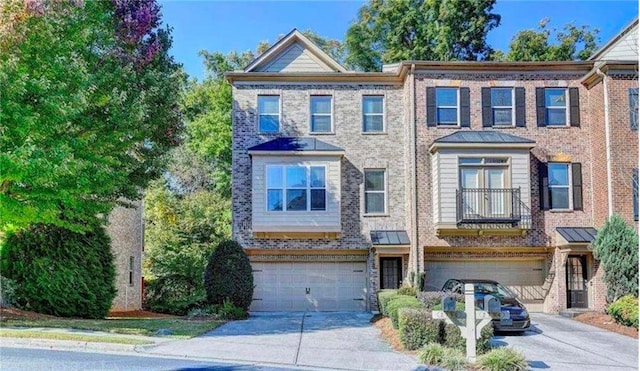 2790 Laurel Valley Trl, Buford, GA 30519 - multi unit property featuring brick siding, a garage, and driveway