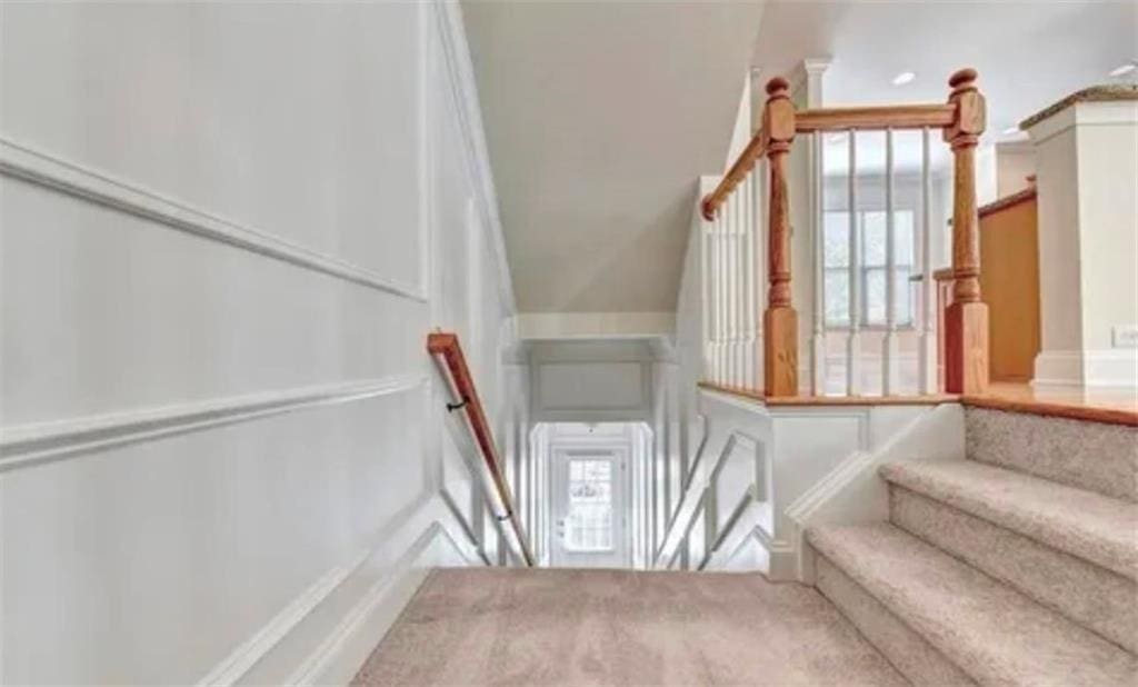 2790 Laurel Valley Trl, Buford, GA 30519 - staircase with carpet and lofted ceiling
