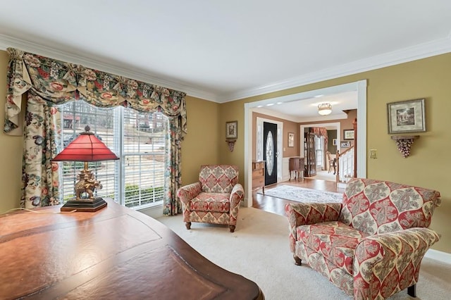 carpeted living room featuring crown molding