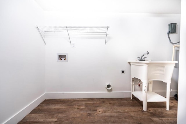8420 Sheridan Dr, Jonesboro, GA 30236 - laundry room featuring wood finished floors, hookup for a washing machine, electric dryer hookup, and baseboards