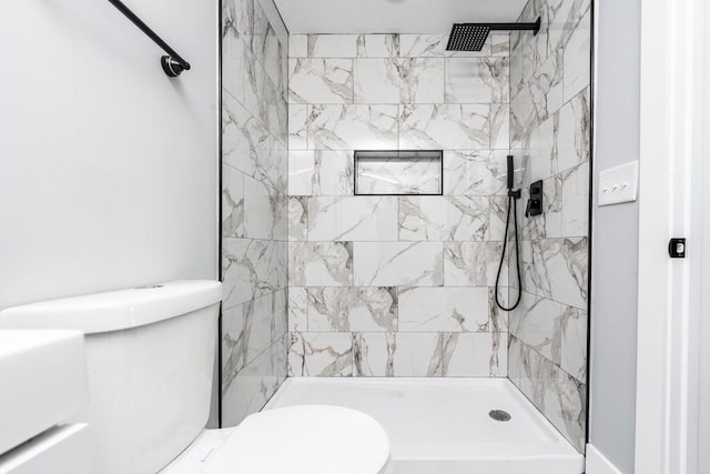 8420 Sheridan Dr, Jonesboro, GA 30236 - bathroom with toilet and a tile shower