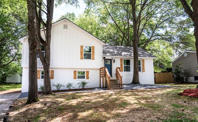 8420 Sheridan Dr, Jonesboro, GA 30236 - tri-level home with brick siding, board and batten siding, and a shingled roof