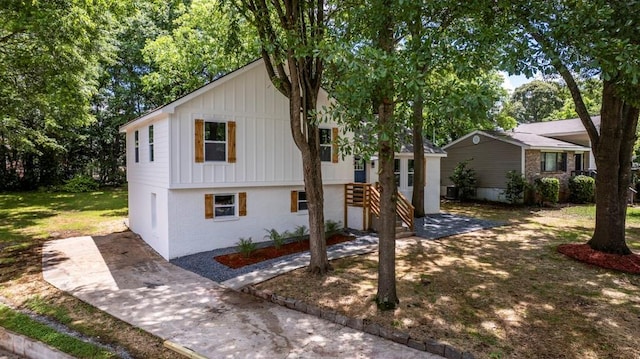 8420 Sheridan Dr, Jonesboro, GA 30236 - view of front of home with board and batten siding and brick siding