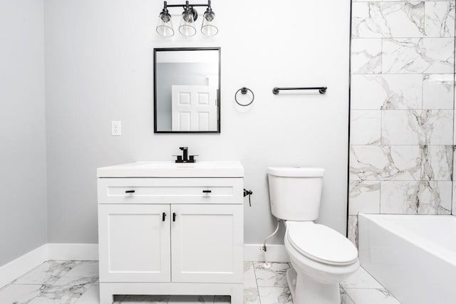 8420 Sheridan Dr, Jonesboro, GA 30236 - bathroom featuring marble look tile flooring, baseboards, and vanity