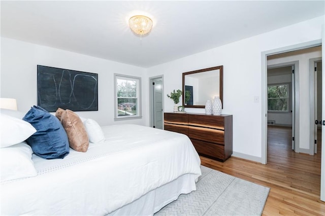 bedroom featuring light hardwood / wood-style floors