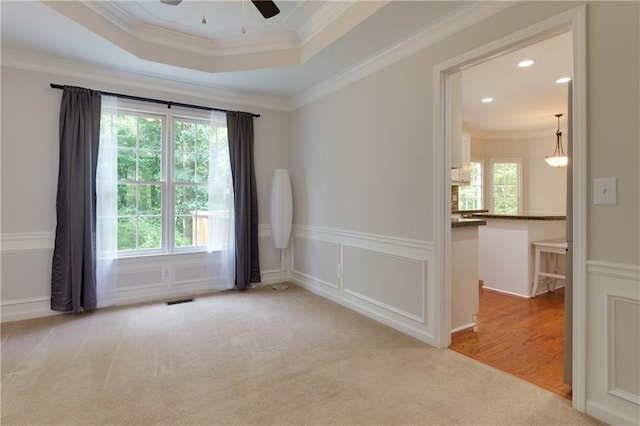 2995 Aspen Ridge Ct, Snellville, GA 30078 - empty room featuring carpet flooring, crown molding, a ceiling fan, a tray ceiling, and recessed lighting