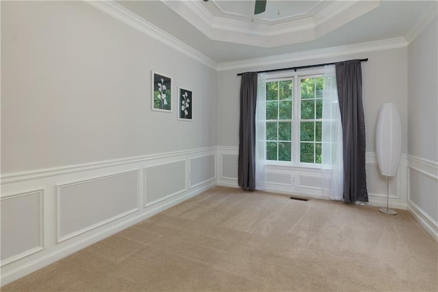 2995 Aspen Ridge Ct, Snellville, GA 30078 - carpeted spare room with a decorative wall, ornamental molding, a tray ceiling, wainscoting, and ceiling fan