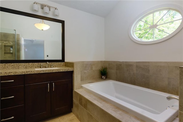 2995 Aspen Ridge Ct, Snellville, GA 30078 - full bathroom featuring vanity, a bath, and tile patterned flooring