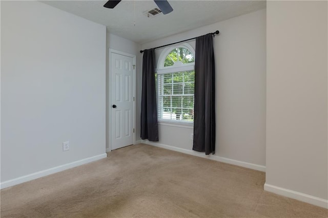 2995 Aspen Ridge Ct, Snellville, GA 30078 - unfurnished room with light colored carpet, baseboards, and ceiling fan