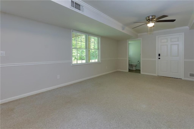 2995 Aspen Ridge Ct, Snellville, GA 30078 - spare room with light colored carpet, ornamental molding, ceiling fan, and baseboards