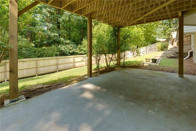 2995 Aspen Ridge Ct, Snellville, GA 30078 - fenced backyard featuring a patio area