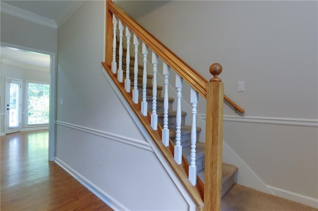 2995 Aspen Ridge Ct, Snellville, GA 30078 - stairway featuring crown molding, baseboards, and wood finished floors