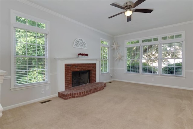 2995 Aspen Ridge Ct, Snellville, GA 30078 - unfurnished living room featuring a fireplace, baseboards, ornamental molding, a ceiling fan, and carpet floors