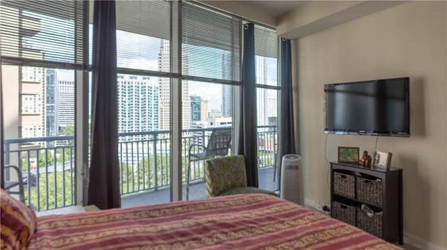 3338 Peachtree Rd NE Unit 1506, Atlanta, GA 30326 - bedroom featuring multiple windows