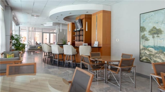 3338 Peachtree Rd NE Unit 1506, Atlanta, GA 30326 - dining space featuring a drop ceiling