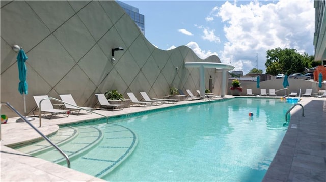3338 Peachtree Rd NE Unit 1506, Atlanta, GA 30326 - community pool featuring a patio