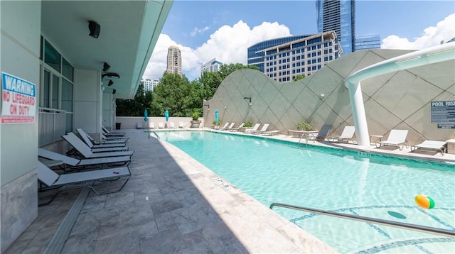 3338 Peachtree Rd NE Unit 1506, Atlanta, GA 30326 - community pool featuring a patio area
