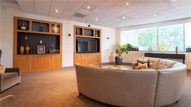 3338 Peachtree Rd NE Unit 1506, Atlanta, GA 30326 - living area featuring built in features, carpet, and a paneled ceiling