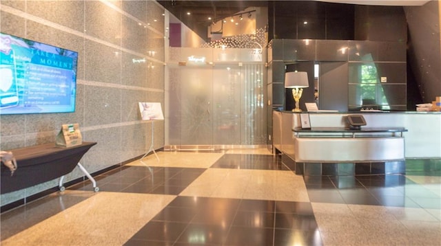 3338 Peachtree Rd NE Unit 1506, Atlanta, GA 30326 - reception area with tile walls