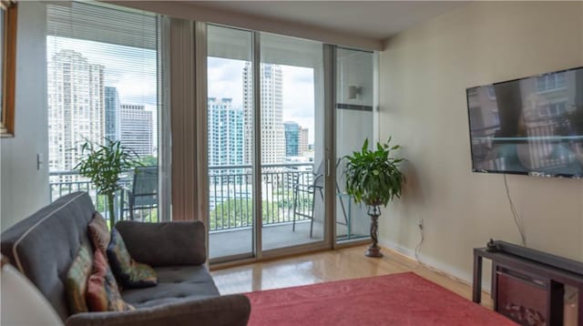 3338 Peachtree Rd NE Unit 1506, Atlanta, GA 30326 - living area with wood finished floors and baseboards