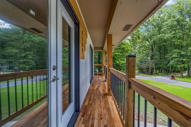4260 Bonaparte Dr, Tucker, GA 30084 - balcony featuring french doors and view of wooded area