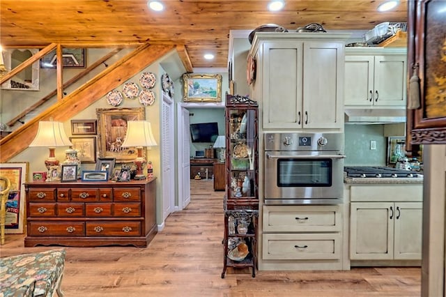 476 Franklin St, Dillard, GA 30537 - kitchen featuring stainless steel appliances, recessed lighting, light wood-style floors, and under cabinet range hood