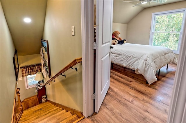 476 Franklin St, Dillard, GA 30537 - bedroom with light wood-type flooring and vaulted ceiling
