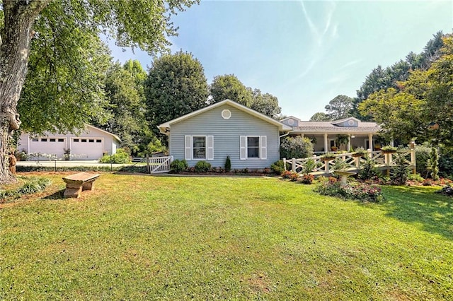 476 Franklin St, Dillard, GA 30537 - rear view of property with a lawn and a garage