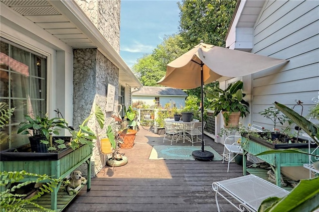 476 Franklin St, Dillard, GA 30537 - wooden deck with outdoor dining space