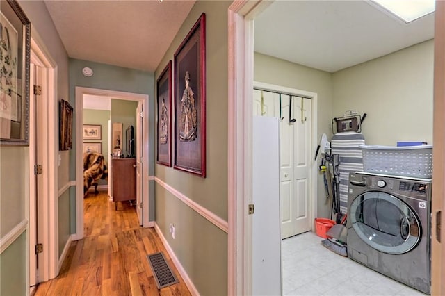 476 Franklin St, Dillard, GA 30537 - washroom with washer / clothes dryer and light wood finished floors
