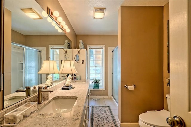 476 Franklin St, Dillard, GA 30537 - full bath featuring double vanity, a shower stall, and tile patterned floors