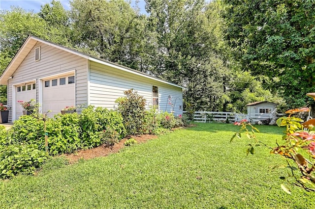 476 Franklin St, Dillard, GA 30537 - view of yard with an outdoor structure, a detached garage, and view of scattered trees