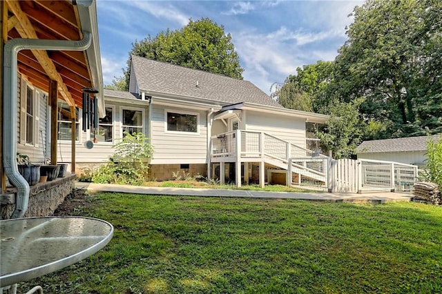 476 Franklin St, Dillard, GA 30537 - rear view of property with a lawn and roof with shingles