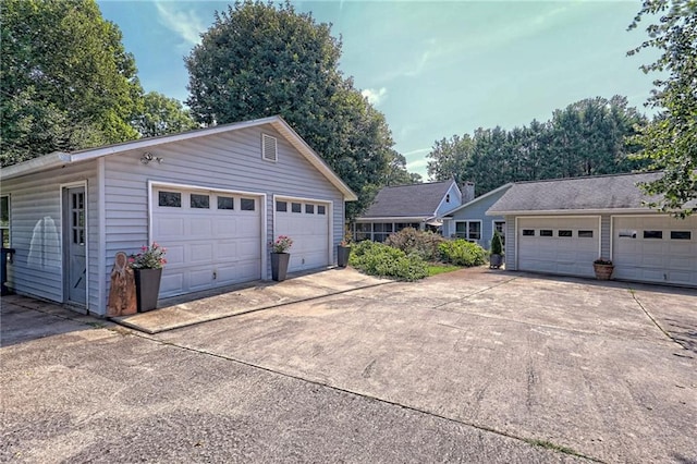 476 Franklin St, Dillard, GA 30537 - view of front of property with an outdoor structure and a garage