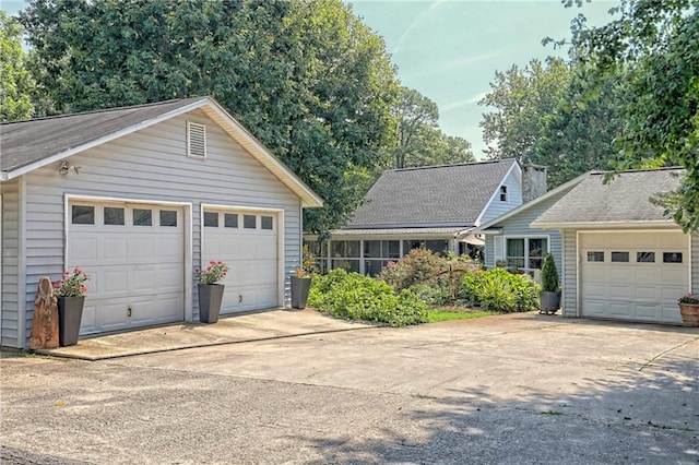 476 Franklin St, Dillard, GA 30537 - view of front facade with a detached garage and an outdoor structure
