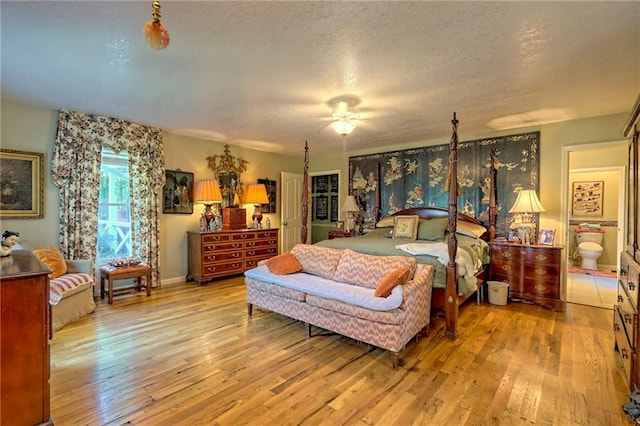 476 Franklin St, Dillard, GA 30537 - bedroom featuring hardwood / wood-style floors, a textured ceiling, and ceiling fan