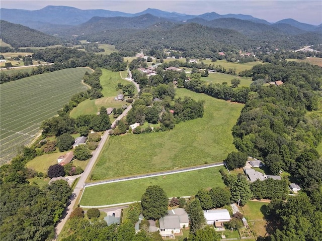 476 Franklin St, Dillard, GA 30537 - aerial view of property and surrounding area with a mountainous background and rural landscape