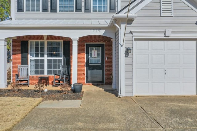 property entrance with a garage