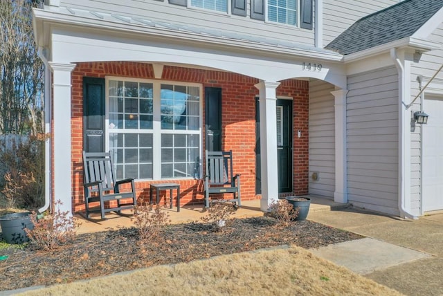 doorway to property featuring a porch