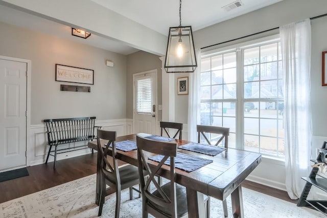 dining space featuring hardwood / wood-style floors