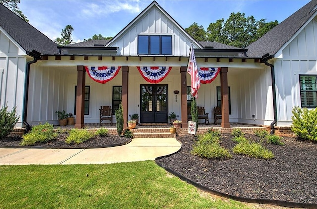 884 Oxford Rd, Ball Ground, GA 30107 - view of front of property featuring board and batten siding, a porch, roof with shingles, and french doors