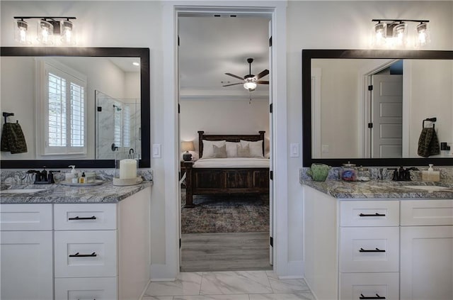 884 Oxford Rd, Ball Ground, GA 30107 - full bath featuring ensuite bath, marble look tiles, ceiling fan, tiled shower, and two vanities