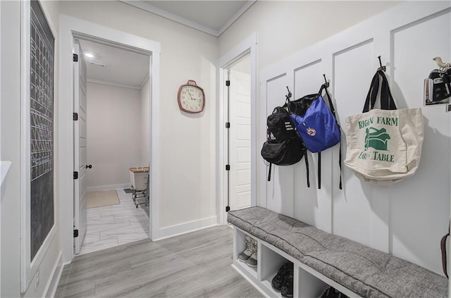 884 Oxford Rd, Ball Ground, GA 30107 - mudroom with ornamental molding and marble finish flooring