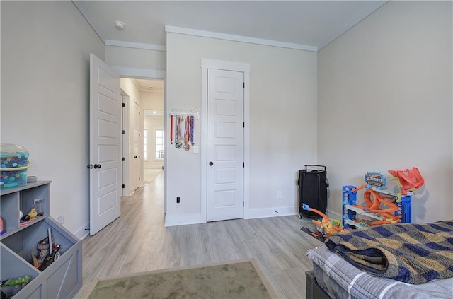884 Oxford Rd, Ball Ground, GA 30107 - bedroom featuring wood finished floors and ornamental molding