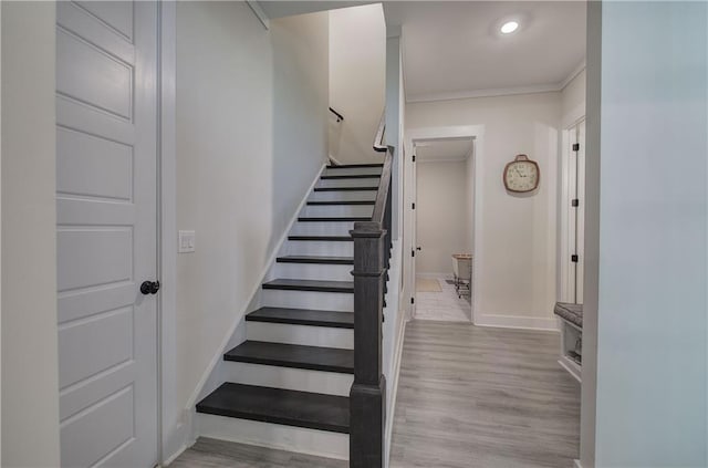 884 Oxford Rd, Ball Ground, GA 30107 - staircase featuring ornamental molding, wood finished floors, and recessed lighting