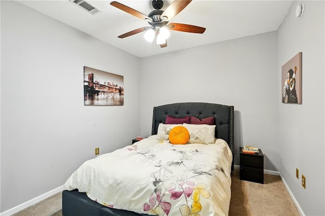 bedroom featuring carpet, visible vents, ceiling fan, and baseboards