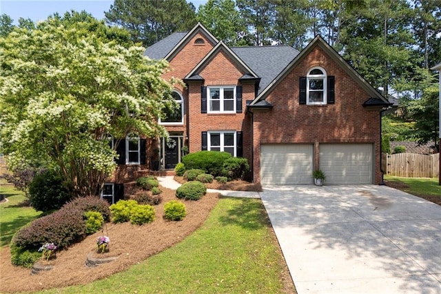 809 Hillcrest Ln, Woodstock, GA 30189 - traditional-style home featuring an attached garage, brick siding, and concrete driveway