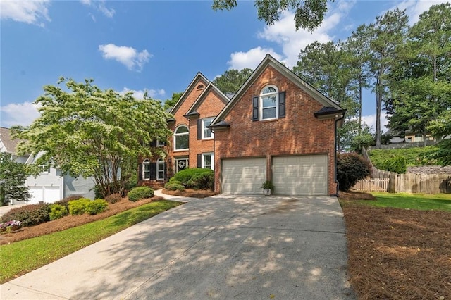 809 Hillcrest Ln, Woodstock, GA 30189 - view of front of home featuring an attached garage, concrete driveway, and brick siding